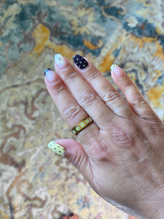 Silver daisy fidget rings
